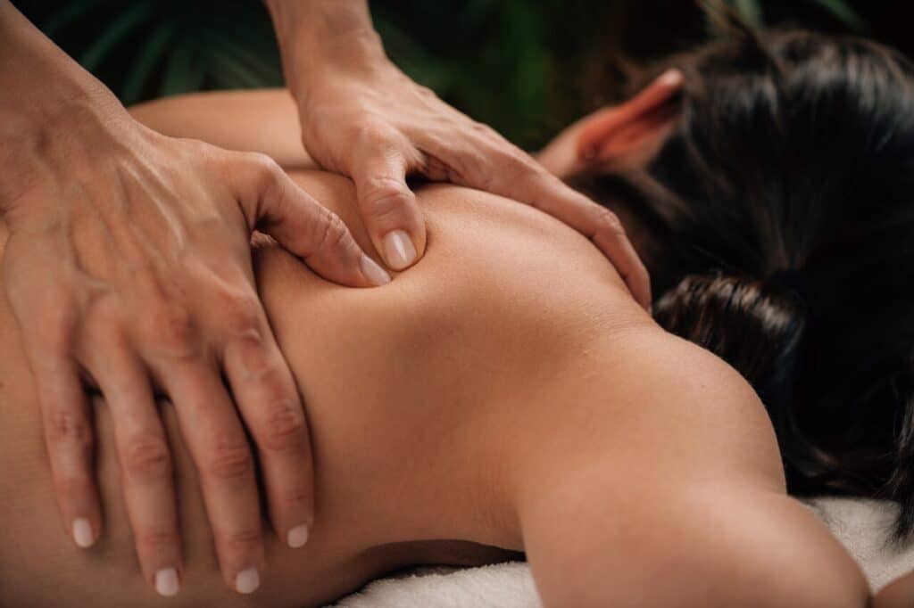 Woman enjoying deep tissue massage